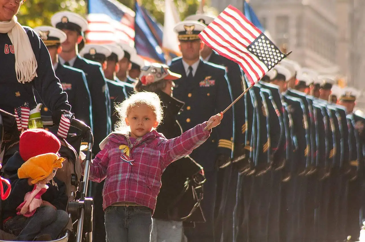 US_Coast_Guard_families_and_service_members_march_in_New_York_City’s_Veterans_Day_Parade_(Image_4_of_7)_(10820800325) Thank you for your service! Image of U.S. Coast Guard families and service members in New York City Veterans Day Parade, also used for Memorial Day 2024 blog post
